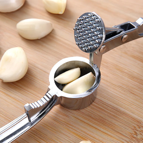 Yixoo Manual garlic press and crusher